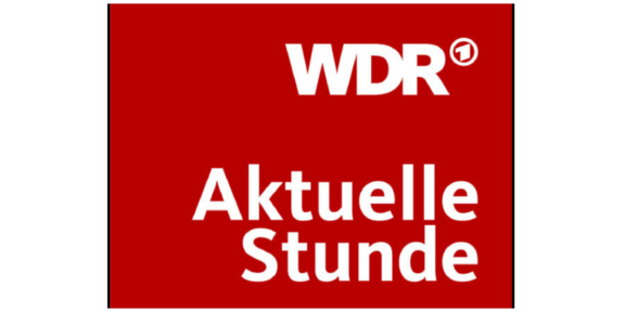 Aktuelle Stunde Roter Hintergrund mit weißen Schriftzug WDR Aktuelle Stunde